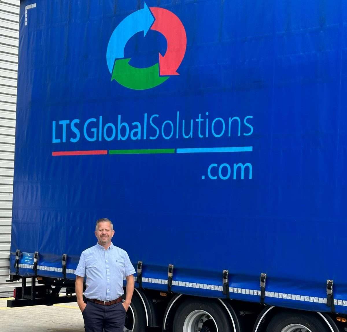 Depot manager stood in front of LTS truck