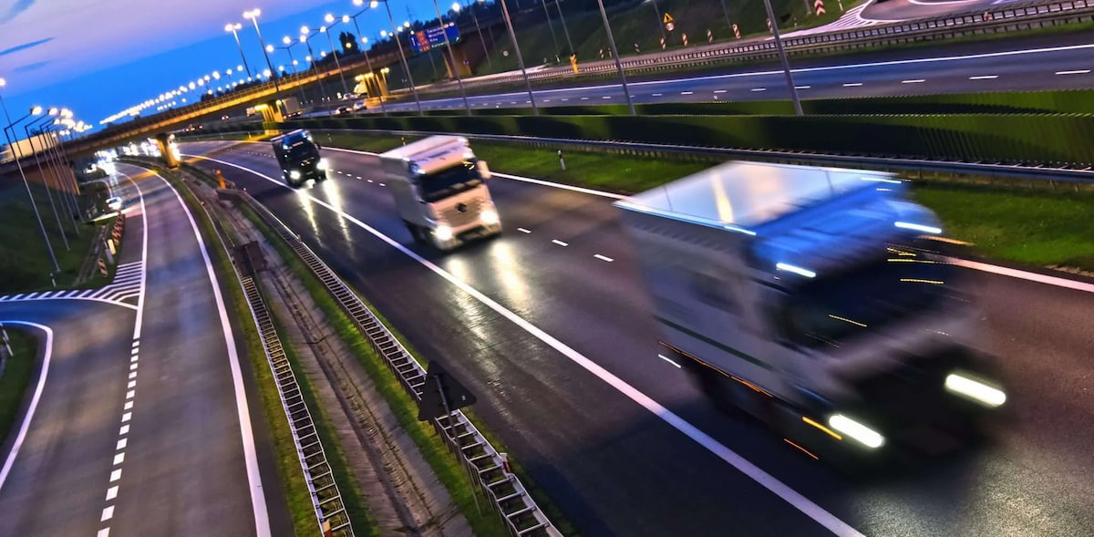 Cars in motion on the motorway at night